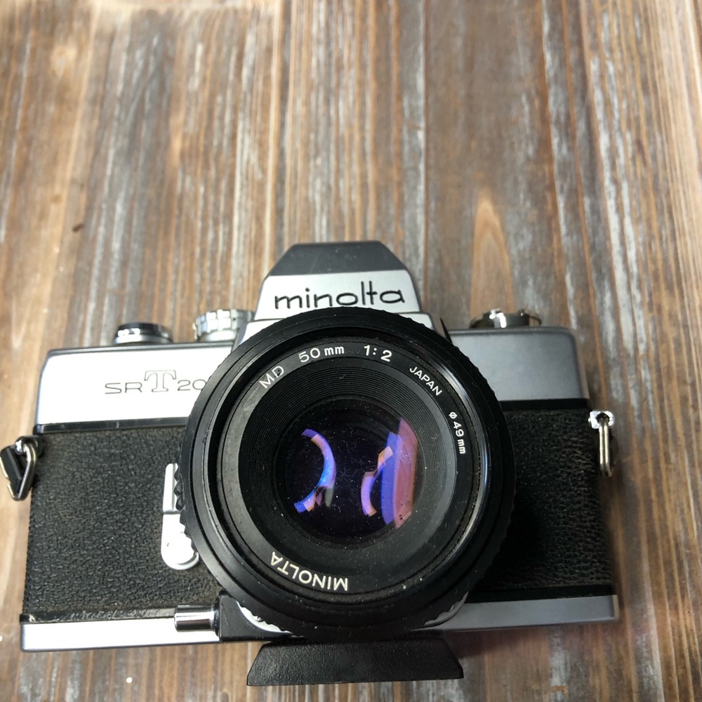 PRE-OWNED / UNTESTED . 'does CLICK and wind" Minolta SrT 201